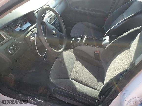 2012 Chevrolet Impala Police Police with VIN 2G1WD5E31C1241355, listed as a Copart auction lot 42932745 with 117,878 mi miles and Salvage Title. Bid and sale history available at carsss.com. Image 7.