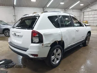 2014 Jeep Compass Sport with VIN 1C4NJDBB3ED773960, listed as a IAAI auction lot 41989986 with 126,875 mi miles. Bid and sale history available at carsss.com. Image 4.