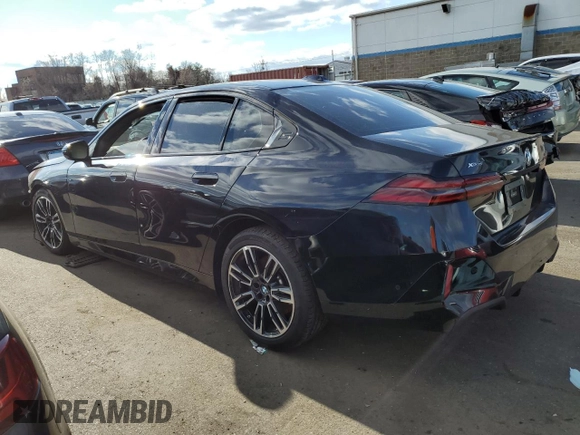 2024 BMW 5 Series 540i xDrive with VIN WBA63FJ0XRCS21259, listed as a Copart auction lot 84706904 with 0 mi miles and Salvage Title. Bid and sale history available at carsss.com. Image 2.