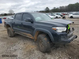 2023 Toyota Tacoma 4WD SR with VIN 3TYCZ5ANXPT113315, listed as a Copart auction lot 43468525 with 58,873 mi miles and Salvage Title. Bid and sale history available at carsss.com. Image 4.
