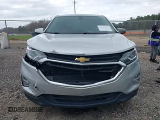 2018 Chevrolet Equinox LT z VIN 3GNAXSEV0JS524721, wystawiony jako IAAI lot #41826347 z przebiegiem 127 923 mil mil oraz . Historia ofert i sprzedaży dostępna na DreamBid. Obrazek 12.