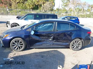 2021 Toyota Corolla SE with VIN 5YFS4MCE3MP063746, listed as a IAAI auction lot 41472956 with 72,199 mi miles. Bid and sale history available at carsss.com. Image 14.