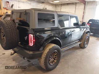 2022 Ford Bronco with VIN 1FMDE5DH0NLB06451, listed as a IAAI auction lot 42060509 with 55,624 mi miles and . Bid and sale history available at DreamBid. Image 4.