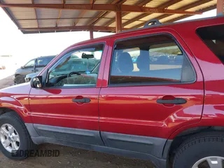 2006 Ford Escape XLT with VIN 1FMYU93126KB18365, listed as a IAAI auction lot 41889706 with 134,718 mi miles. Bid and sale history available at carsss.com. Image 14.