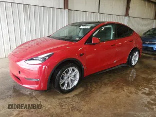 2023 Tesla Model Y Long Range z VIN 7SAYGAEE8PF701618, wystawiony jako Copart lot #57573875 z przebiegiem 39 463 mil mil oraz Szkoda całkowita • Salvage title. Historia ofert i sprzedaży dostępna na DreamBid. Obrazek 1.