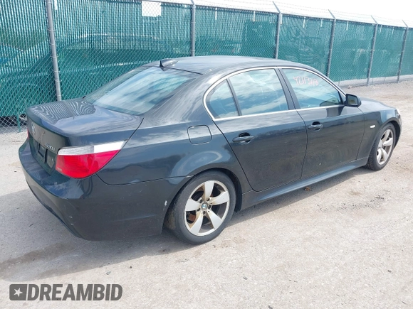 2007 BMW 5 Series 530i with VIN WBANE73597CM56897, listed as a IAAI auction lot 42113113 with 212,774 mi miles. Bid and sale history available at carsss.com. Image 4.