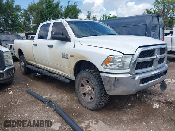 2018 Ram 2500 Tradesman z VIN 3C6UR5HJ5JG284053, wystawiony jako IAAI lot #42672148 z przebiegiem 158 783 mil mil oraz . Historia ofert i sprzedaży dostępna na DreamBid. Obrazek 1.
