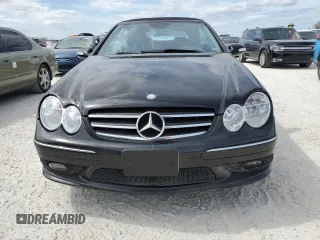 2004 Mercedes-Benz CLK 500 with VIN WDBTK75G04T005692, listed as a Copart auction lot 77038514 with 125,997 mi miles and Salvage Title. Bid and sale history available at DreamBid. Image 5.