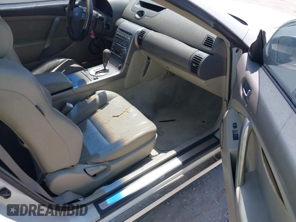 2004 Infiniti G35 Coupe w/Leather with VIN JNKCV54E64M812708, listed as a IAAI auction lot 42006119 with 170,543 mi miles. Bid and sale history available at carsss.com. Image 5.