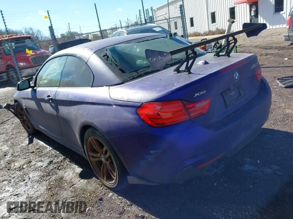 2014 BMW 4 Series 428i xDrive with VIN WBA3T1C58EPS98939, listed as a IAAI auction lot 41649313 with 35,994 mi miles and . Bid and sale history available at carsss.com. Image 3.