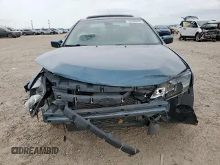 2012 Ford Fusion SEL z VIN 3FAHP0JG1CR141390, wystawiony jako Copart lot #59308505 z przebiegiem 63 955 mil mil oraz Szkoda całkowita • Salvage title. Historia ofert i sprzedaży dostępna na DreamBid. Obrazek 5.