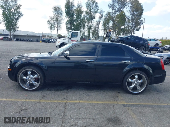 2007 Chrysler 300 with VIN 2C3KA43R57H852331, listed as a IAAI auction lot 41946742 with 211,168 mi miles. Bid and sale history available at carsss.com. Image 15.