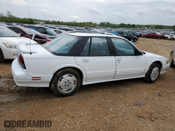 1997 Oldsmobile Cutlass Supreme S z VIN 1G3WH52M2VF322529, wystawiony jako Copart lot #52003574 z przebiegiem 140 292 mil mil oraz Szkody całkowita. Historia ofert i sprzedaży dostępna na DreamBid. Obrazek 3.