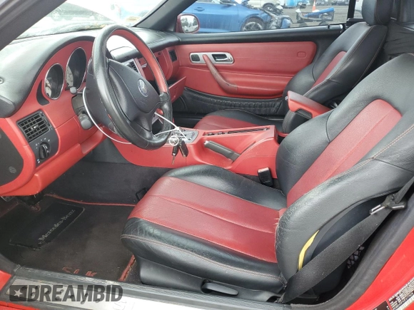 2003 Mercedes-Benz SLK 230 Kompressor z VIN WDBKK49F93F277828, wystawiony jako Copart lot #58344925 z przebiegiem Nie podano mil oraz Czysty tytuł • Clean title. Historia ofert i sprzedaży dostępna na DreamBid. Obrazek 7.