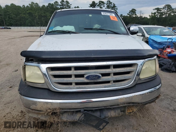 2002 Ford F-150 XL with VIN 1FTRX17L72NB60083, listed as a Copart auction lot 63627985 with Not provided miles and Salvage title. Bid and sale history available at DreamBid. Image 5.