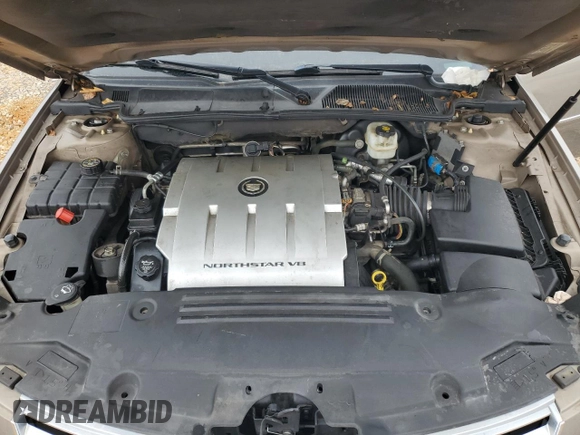 2007 Cadillac DTS V8 z VIN 1G6KD57Y47U115566, wystawiony jako Copart lot #88487785 z przebiegiem 93 484 mil mil oraz Szkoda całkowita • Salvage title. Historia ofert i sprzedaży dostępna na DreamBid. Obrazek 13.