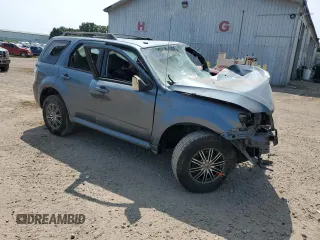 2010 Mercury Mariner with VIN 4M2CN8BG8AKJ18899, listed as a Copart auction lot 64751414 with 0 mi miles and Clean Title. Bid and sale history available at carsss.com. Image 4.