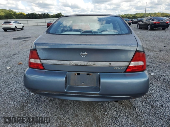 2000 Nissan Altima XE z VIN 1N4DL01D5YC199492, wystawiony jako Copart lot #79334024 z przebiegiem 97 300 mil mil oraz Nie do naprawy • Non repairable. Historia ofert i sprzedaży dostępna na DreamBid. Obrazek 6.