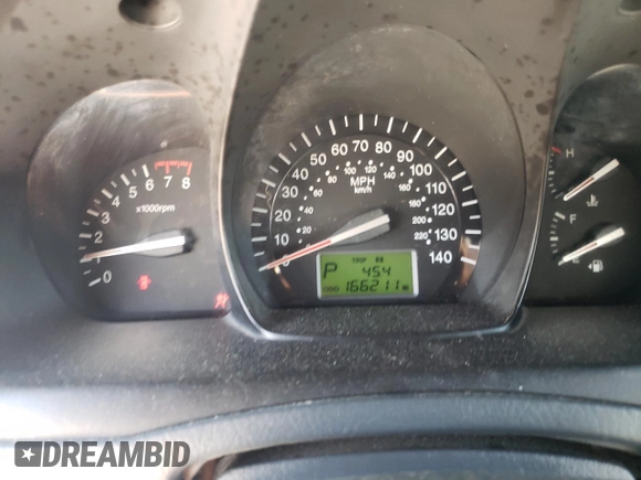 2008 Kia Spectra EX with VIN KNAFE121X85525733, listed as a Copart auction lot 66246444 with 166,211 mi miles and Salvage Title. Bid and sale history available at DreamBid. Image 9.