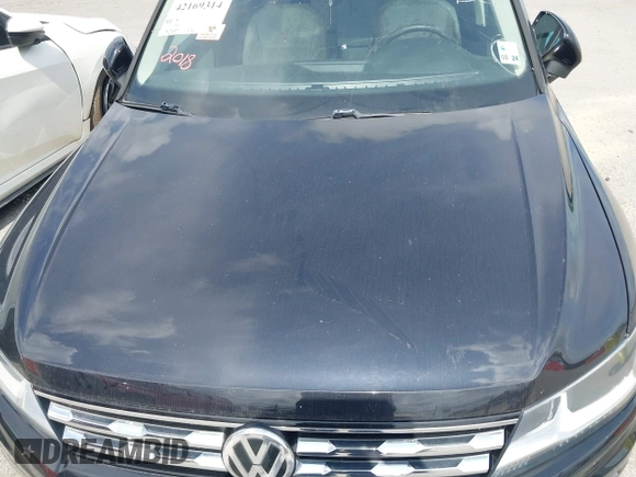 2018 Volkswagen Tiguan SEL with VIN 3VV3B7AX2JM049650, listed as a IAAI auction lot 42169314 with Not Provided miles and . Bid and sale history available at DreamBid. Image 10.