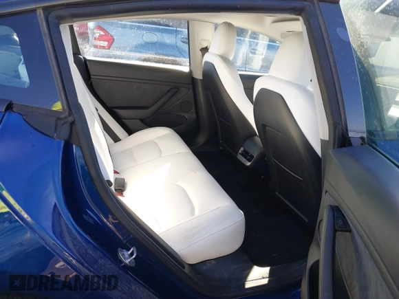 2023 Tesla Model 3 Long Range with VIN 5YJ3E1EB5PF623706, listed as a IAAI auction lot 41321269 with 21,081 mi miles and . Bid and sale history available at DreamBid. Image 8.