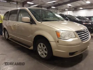2010 Chrysler Town & Country Touring with VIN 2A4RR5D17AR184092, listed as a IAAI auction lot 41727926 with 158,937 mi miles and . Bid and sale history available at DreamBid. Image 1.
