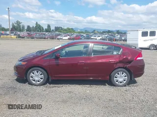 2011 Honda Insight LX z VIN JHMZE2H51BS004312, wystawiony jako IAAI lot #42086422 z przebiegiem 72 814 mil mil oraz . Historia ofert i sprzedaży dostępna na DreamBid. Obrazek 14.