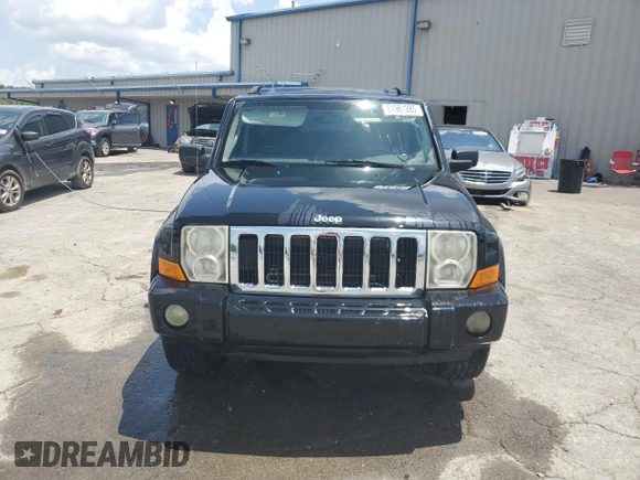 2008 Jeep Commander Sport z VIN 1J8HH48K58C126172, wystawiony jako Copart lot #61961285 z przebiegiem 235 022 mil mil oraz Szkoda całkowita • Salvage title. Historia ofert i sprzedaży dostępna na DreamBid. Obrazek 5.