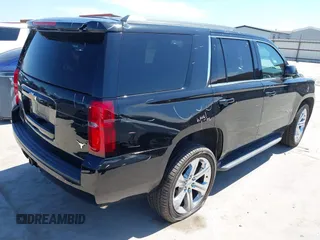 2017 Chevrolet Tahoe LT with VIN 1GNSCBKC3HR373650, listed as a IAAI auction lot 42210651 with 131,091 mi miles and . Bid and sale history available at DreamBid. Image 4.