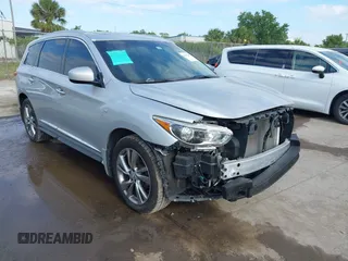 2014 Infiniti QX60 with VIN 5N1AL0MM0EC525019, listed as a IAAI auction lot 42035281 with 137,831 mi miles. Bid and sale history available at carsss.com. Image 1.