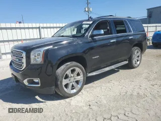 2018 GMC Yukon SLT with VIN 1GKS1BKC9JR108210, listed as a Copart auction lot 50465765 with 106,542 mi miles and Salvage Title. Bid and sale history available at carsss.com. Image 1.