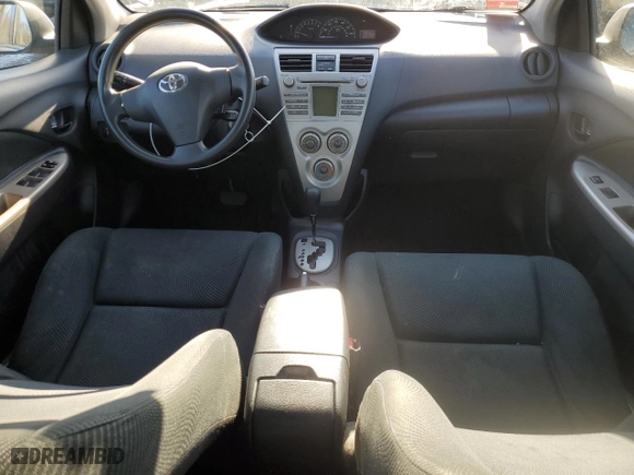 2009 Toyota Yaris with VIN JTDBT903994041702, listed as a Copart auction lot 86693314 with 136,317 mi miles and Salvage Title. Bid and sale history available at carsss.com. Image 8.