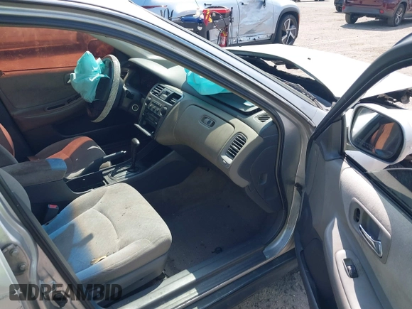 2002 Honda Accord LX z VIN JHMCG56462C005400, wystawiony jako IAAI lot #41893400 z przebiegiem Nie podano mil oraz . Historia ofert i sprzedaży dostępna na DreamBid. Obrazek 5.