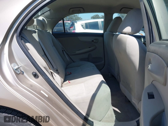 2009 Toyota Corolla with VIN 1NXBU40E59Z156570, listed as a IAAI auction lot 42417219 with 157,388 mi miles and . Bid and sale history available at DreamBid. Image 8.