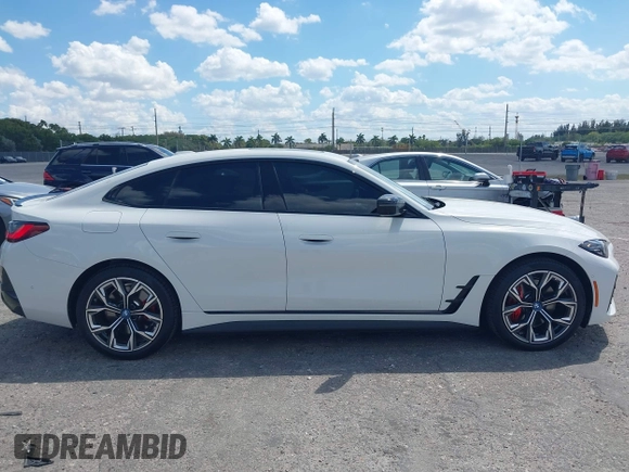 2024 BMW i4 eDrive35 z VIN WBY43AW02RFS79370, wystawiony jako IAAI lot #41887964 z przebiegiem 11 910 mil mil oraz . Historia ofert i sprzedaży dostępna na DreamBid. Obrazek 13.