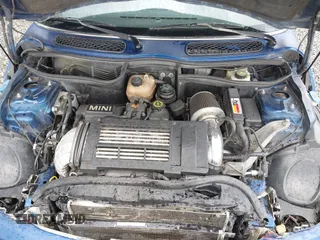 2003 MINI Hardtop S z VIN WMWRE33433TD60388, wystawiony jako IAAI lot #42313209 z przebiegiem 125 869 mil mil oraz . Historia ofert i sprzedaży dostępna na DreamBid. Obrazek 10.
