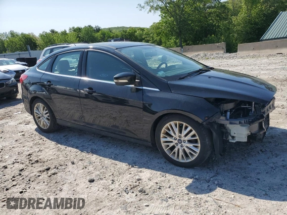 2015 Ford Focus Titanium with VIN 1FADP3J2XFL200489, listed as a Copart auction lot 56443215 with 139,990 mi miles and Clean title. Bid and sale history available at DreamBid. Image 4.