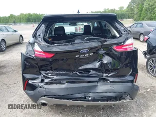 2021 Ford Edge Titanium z VIN 2FMPK3K99MBA16882, wystawiony jako IAAI lot #42214606 z przebiegiem 140 031 mil mil oraz . Historia ofert i sprzedaży dostępna na DreamBid. Obrazek 6.