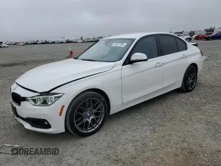 2018 BMW 3 Series 320i xDrive with VIN WBA8E5G5XJNV02809, listed as a Copart auction lot 59537655 with 56,367 mi miles and Salvage title. Bid and sale history available at DreamBid. Image 1.