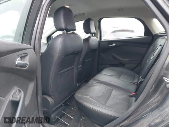 2015 Ford Focus SE with VIN 1FADP3K27FL387012, listed as a IAAI auction lot 42100945 with 85,588 mi miles. Bid and sale history available at carsss.com. Image 8.
