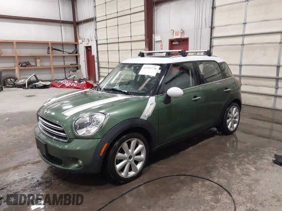 2015 MINI Countryman with VIN WMWZB3C50FWR43714, listed as a IAAI auction lot 41589778 with 93,404 mi miles and . Bid and sale history available at DreamBid. Image 2.