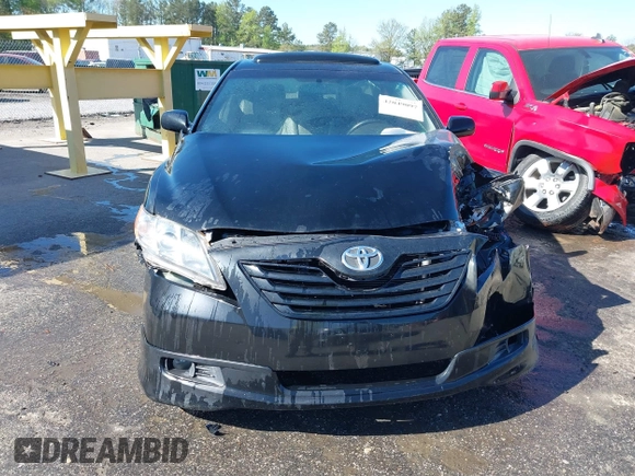 2009 Toyota Camry with VIN 4T1BE46K89U396237, listed as a IAAI auction lot 42049097 with 213,739 mi miles. Bid and sale history available at carsss.com. Image 12.