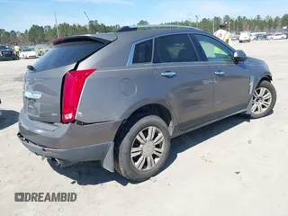 2012 Cadillac SRX Luxury Collection with VIN 3GYFNAE36CS509456, listed as a IAAI auction lot 41833647 with 119,931 mi miles and . Bid and sale history available at carsss.com. Image 4.