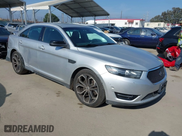 2014 Ford Taurus SHO with VIN 1FAHP2KT8EG123342, listed as a IAAI auction lot 42095390 with 142,957 mi miles. Bid and sale history available at carsss.com. Image 1.
