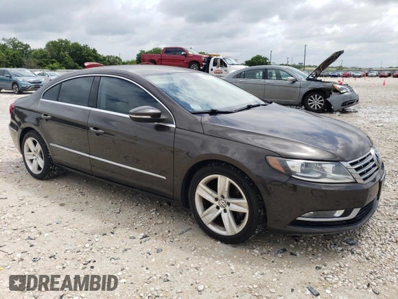 2014 Volkswagen CC R-Line with VIN WVWBN7ANXEE507477, listed as a Copart auction lot 58546374 with 73,792 mi miles and Salvage Title. Bid and sale history available at carsss.com. Image 4.