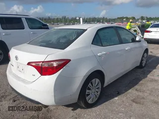 2019 Toyota Corolla L with VIN 2T1BURHE0KC179280, listed as a IAAI auction lot 41944624 with 102,964 mi miles. Bid and sale history available at carsss.com. Image 4.
