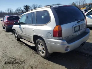 2006 GMC Envoy SLT with VIN 1GKDS13S362362176, listed as a Copart auction lot 43038795 with 180,279 mi miles and Salvage Title. Bid and sale history available at carsss.com. Image 2.