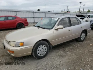 1995 Toyota Camry LE z VIN 4T1SK12E0SU633428, wystawiony jako Copart lot #60245665 z przebiegiem 186 532 mil mil oraz Nie do naprawy • Non repairable. Historia ofert i sprzedaży dostępna na DreamBid. Obrazek 1.