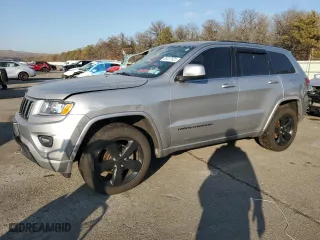 2015 Jeep Grand Cherokee Altitude with VIN 1C4RJFAG0FC136039, listed as a Copart auction lot 89237525 with 124,374 mi miles and Salvage Title. Bid and sale history available at carsss.com. Image 1.
