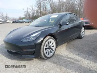 2022 Tesla Model 3 Long Range with VIN 5YJ3E1EB6NF343869, listed as a IAAI auction lot 41826077 with 36,643 mi miles and . Bid and sale history available at DreamBid. Image 16.